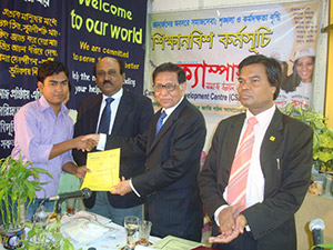 Advisor to the Former Caretaker Government, Mahbub Jamil is giving Certificates to the trainees of Apprenticeship Program as Chief Guest; Next to him CEO of Partex Group, K.M Ali and Secretary-General of CSDC, Dr. M Helal. (2009)